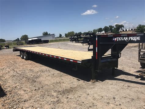 skid steer and trailer rental|flatbed equipment trailers for rent.